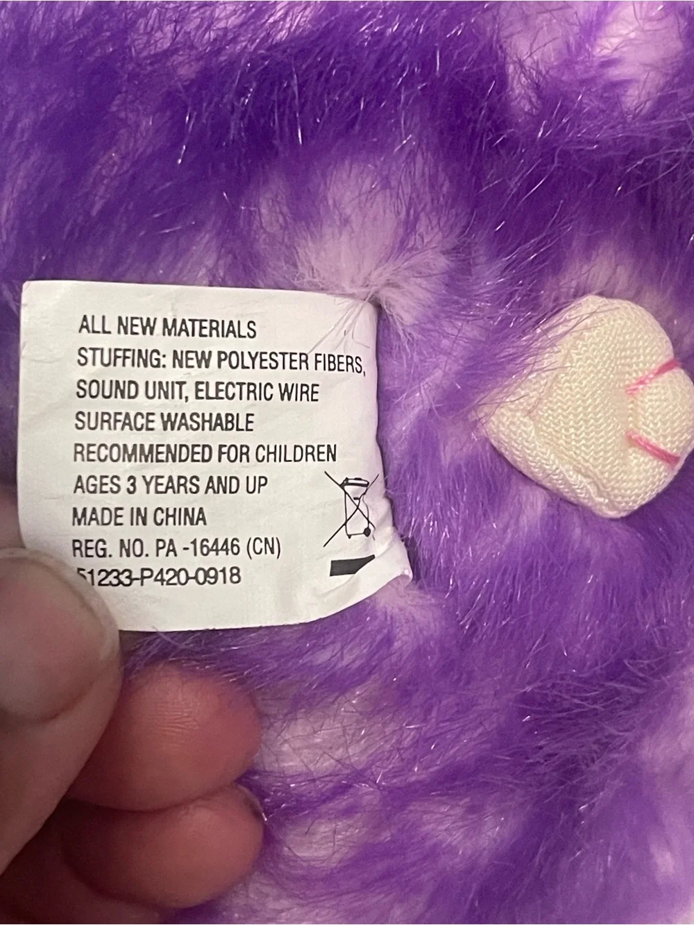 Warner Bros. Purple Plush Pom Pet Stuffed Animal